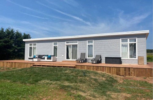 DeSable Cottage | Oceanview haven- steps to the beach in this 2bedroom cottage with large deck