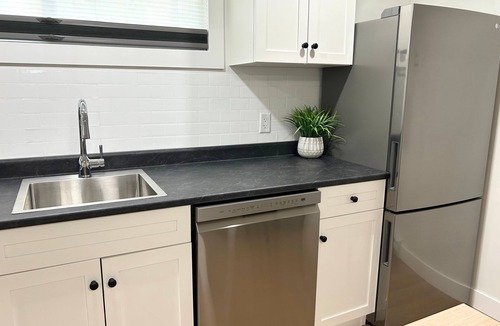 North End Apartment | Parkside Pad in Kelowna's North End. Steps to the brewery district & the lake.