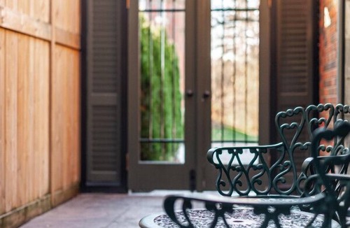 Stratford Apartment | Patio Suite with Sunroom | by Henry House Stays