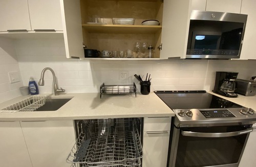 Lower Lonsdale House | Private 1 Bedroom Suite with Assigned Parking