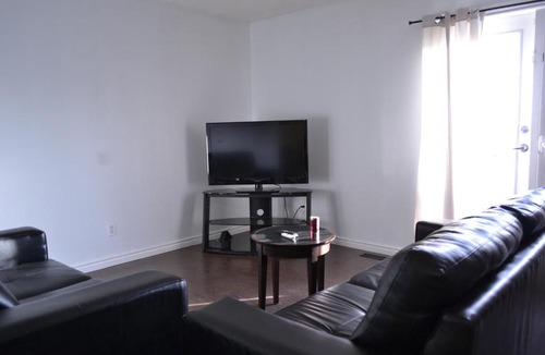 Southeast Calgary House | Private bedroom on renovated duplex main floor - Dover