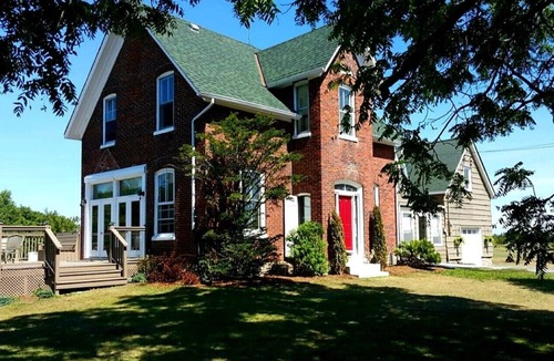 Milford House | Private Century Home Waterfront Getaway with Acreage