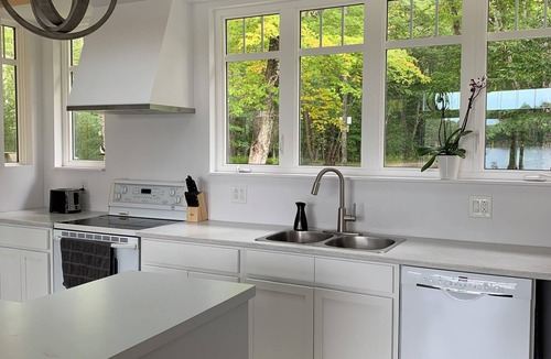 Clare Ski Chalet | Private cottage on 8 wooded and flower-filled acres at Lake Wentworth and the Wentworth River
