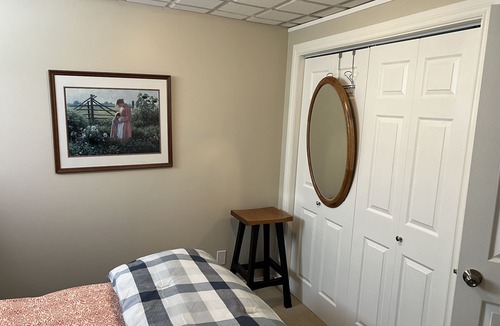 Valley Ridge Bed & Breakfast | Private, quiet, cozy developed basement living area with 2 beds.