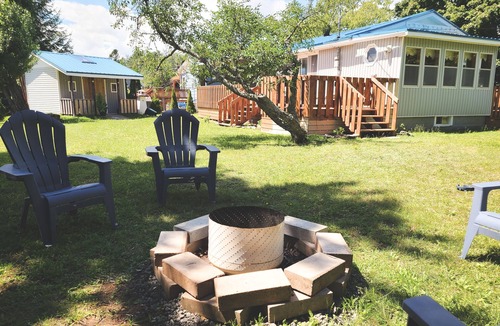 The Bluff Cottage | Quaint beach cottage only 6 minute walk to famous Parlee Beach