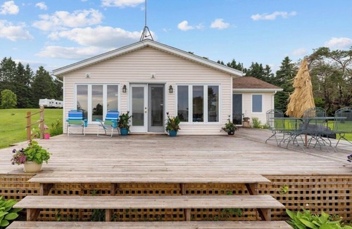 Rice Point Cottage | Quaint Cottage with direct beach access and water views that go on for miles.
