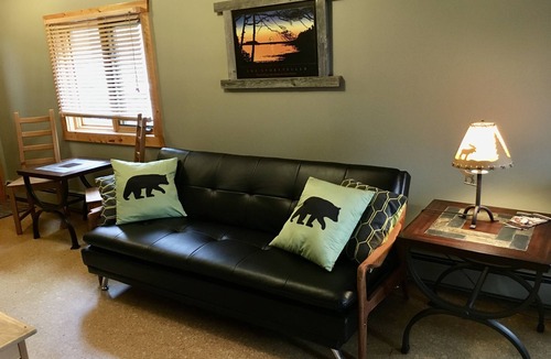 Jasper Apartment | Rare main floor suite, with full kitchen and balcony mountain views.