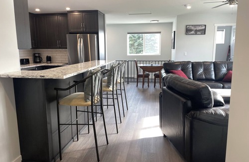 Vernon Apartment | Relax on the deck and enjoy the beautiful lake views, in the North Okanagan