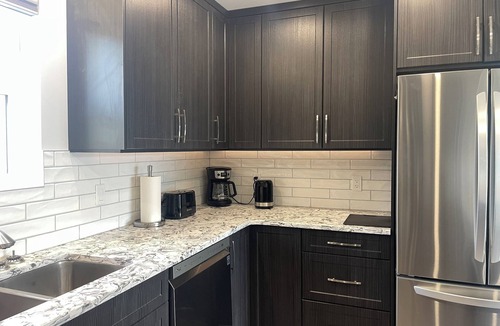 Vernon Apartment | Relax on the deck and enjoy the beautiful lake views, in the North Okanagan