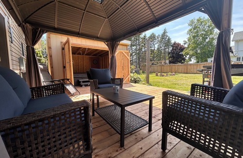 Summerside House | Relax with an enclosed hot tub and cozy island vibes in the heart of Summerside
