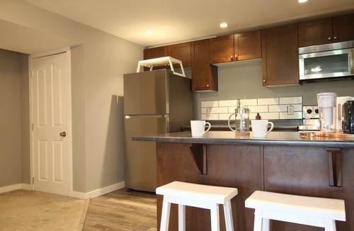 East Hill House | Relaxing guest suite with private patio and beautiful view!