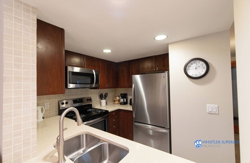 Village North Condo | Renovated Ground Floor Condo. Spacious Floor Plan, Pool & Hot Tub Onsite