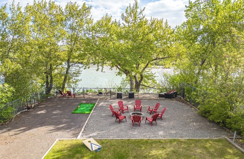 Northwest Calgary House | Riverfront Oasis on Calgary’s Best Street, AC, 5BR