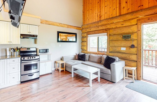 Lac Le Jeune Cabin | Rustic lakefront resort log cabin with deck, internet, and full kitchen