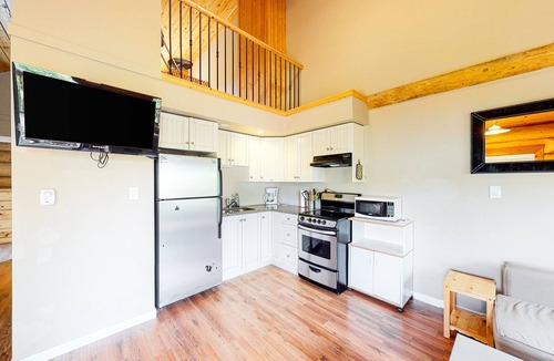 Lac Le Jeune Cabin | Rustic lakefront resort log cabin with deck, internet, and full kitchen