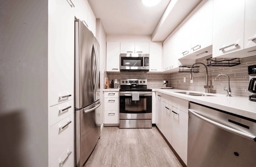 Bridgeland Apartment | Sage on the Bow - Central Condo Family Pets