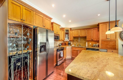 Big White Ski Resort Condo | Ski-in/ski-out condo w/private hot tub, gas fireplace & mountain views