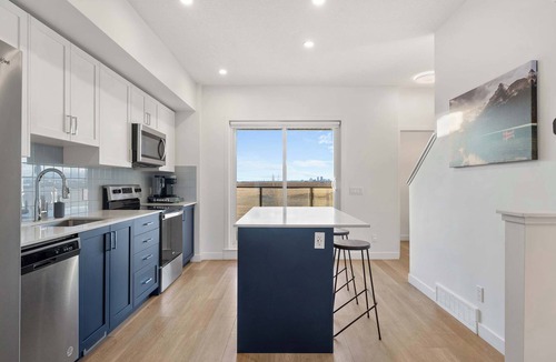 Calgary House | Skyline Retreat | Spacious 4BR Home with Balcony!