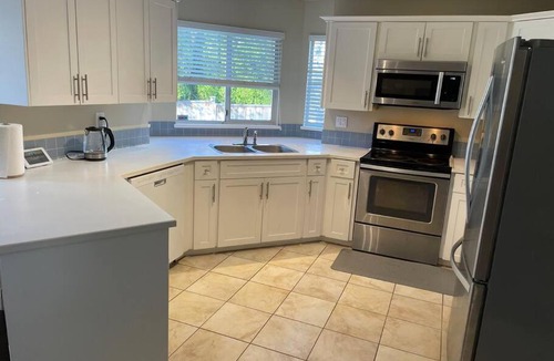 Langley House | Spacious 5-bedroom home with parking