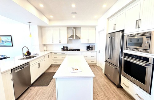 Southeast Calgary House | Spacious 5BR Retreat w/Hot Tub, Fire Pit, Gym & Movie Room