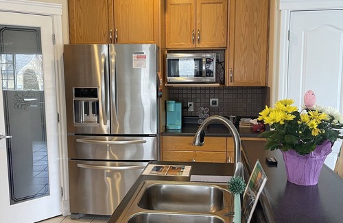 Jasper Place House | Spacious bungalow with large backyard and garage close to West Ed Mall
