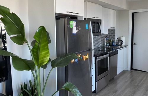 Wexford Condo | SPACIOUS CONDO WITH VIEW OF CITY. POOL.GYM.HOT TUB.SLEEPS 4