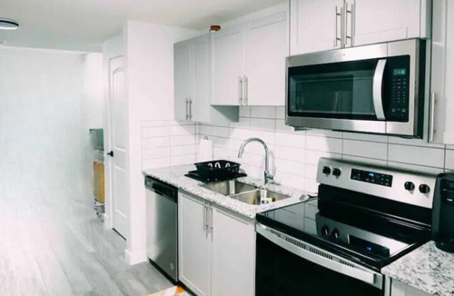 Northwest Calgary House | Starlight Haven: Modern 2-Bedroom Suite, Private Entry near Shopping & Dining