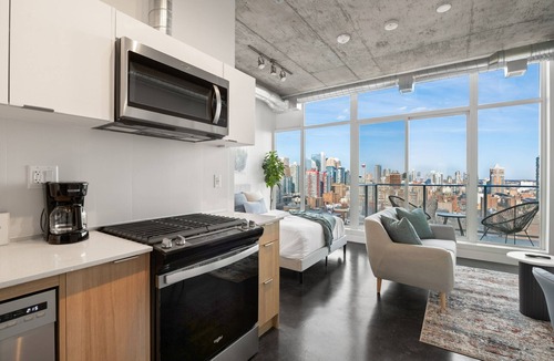 Connaught Apartment | Studio Just Steps from Stampede Park: Luxury Living