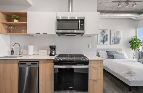 Connaught Apartment | Studio Just Steps from Stampede Park: Luxury Living