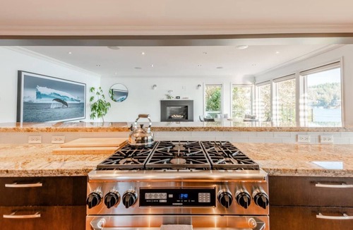 District of North Vancouver House | Stunning Waterfront Deep Cove Home w/Private Dock
