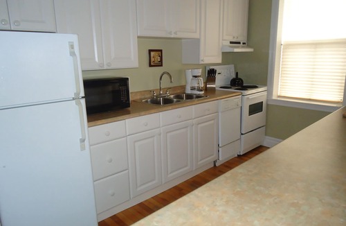 Queens Square Apartment | Stylish Downtown Historic District Suite Near Water Front & Convention Centre