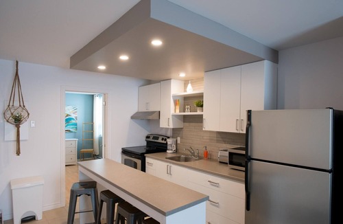 Rouyn-Noranda Apartment | Suite with cloesed bedroom and sofa bed in the city center (Le Court-toit)