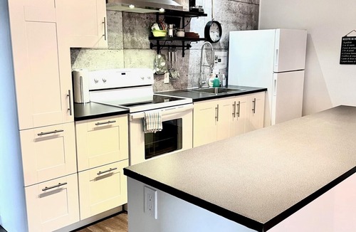 Sutton Condo | SUTTON - CONDO IN THE HEART OF THE VILLAGE