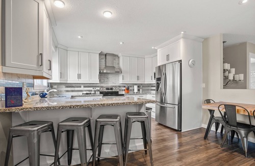 Sylvan Lake House | Sylvan Lake Carriage House ~ Sleeps 4 adults and 2 children ~ Private Patio