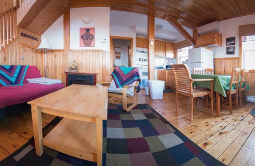 Indian Brook Ski Chalet | Tan Chalet at Cabot Shores Wilderness Resort