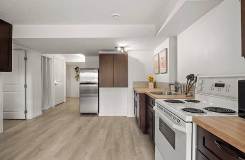 Okotoks Apartment | The Sunflower PrivateEntry PetsOK Patio TV