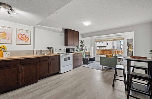 Okotoks Apartment | The Sunflower PrivateEntry PetsOK Patio TV