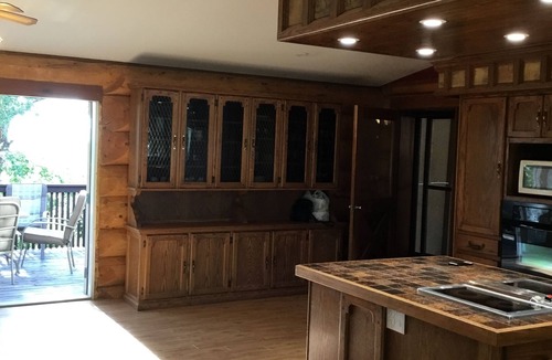 Swift Current House | Three level Log Home on Private 40 Acre Estate.