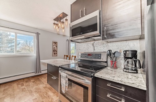 Fort Saskatchewan Apartment | Top Floor Executive Luxury Condo Heated Underground Parking & only 3km’s to Dow