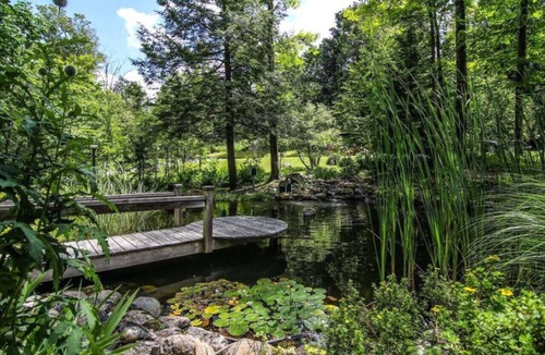 Knowlton Ski Chalet | Tranquil Haven near the Charming Village of Knowlton - Sleeps 12 - Whole House & 2 Acres with Pond, Bridge, Grounds, and Woods