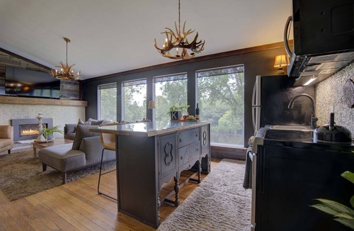 Greater Napanee Apartment | Tranquil/Private King Suite, Cozy, Riverfront w/hot tub,fireplace,firepit,trail.