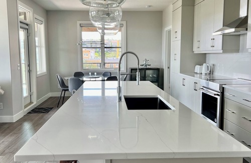 Southwest Calgary Condo | Upscale luxury 2 bed plus office with panoramic views of the rolling foothills!