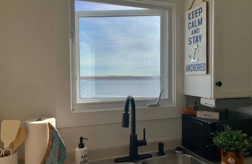 Cormierville Cottage | Wake up to the Sunrise in This Renovated Ocean-front Cottage!