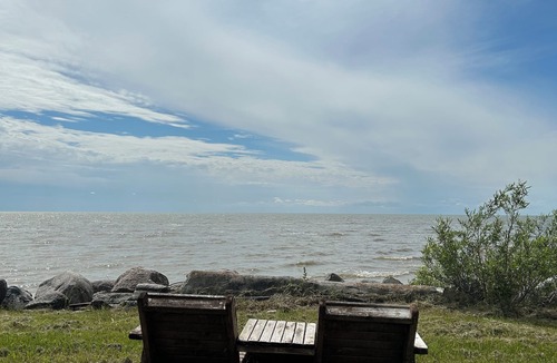 Saint Ambroise Cottage | Water's Edge cedar cabin on 1 acre lakefront: a perfect retreat summer or winter