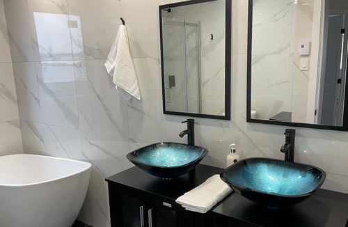Laval Apartment | Waterfront unit with outdoor hot tub