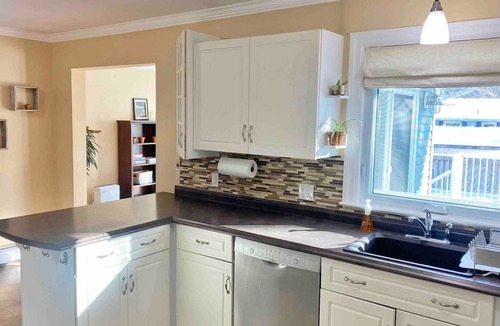 Fredericton House | Welcome to your home away from home located in a quiet family-friendly neighborhood