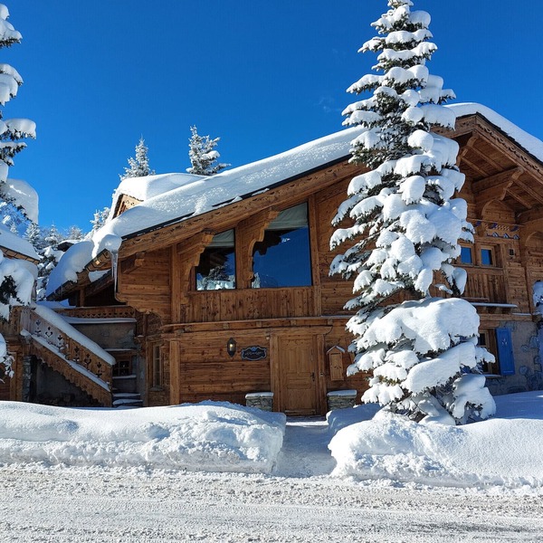 Family Chalet with Spa in Courchevel 1850 – Ski-In/Ski-Out, Fireplace, Concierge Services