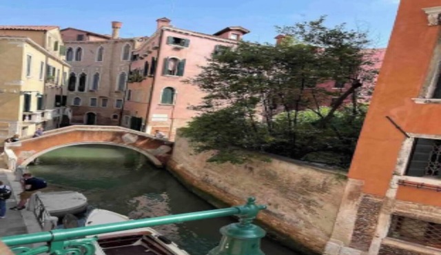 Charming Canal View Apartment in Historic Venetian Palace