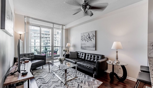 Elegant Downtown Oasis with City and Lake Views Plus Parking!