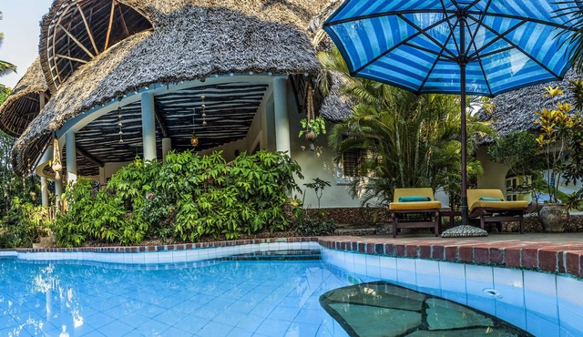 Large luxury beachside villa with a pool, guesthouse, cook, gardener, and maid